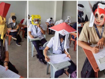 Usan sombreros para evitar copiar en exámenes