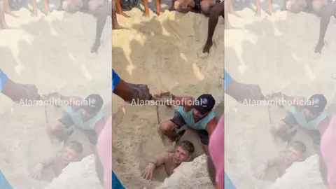 Hombre atrapado en una playa de Brasil Hombre atrapado en una playa de Brasil