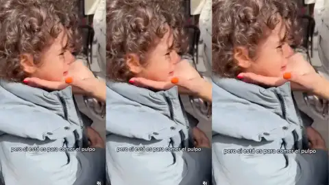 El niño llora porque no quiere que se coman el pulpo El niño llora porque no quiere que se coman el pulpo