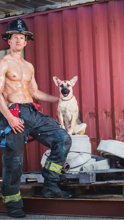 firefighter-poses-topless-calendar-adopts-dog-5.jpg