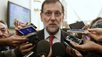 Spain's Prime Minister Mariano Rajoy talks to reporters after a control session at Spanish parliament in Madrid, Spain