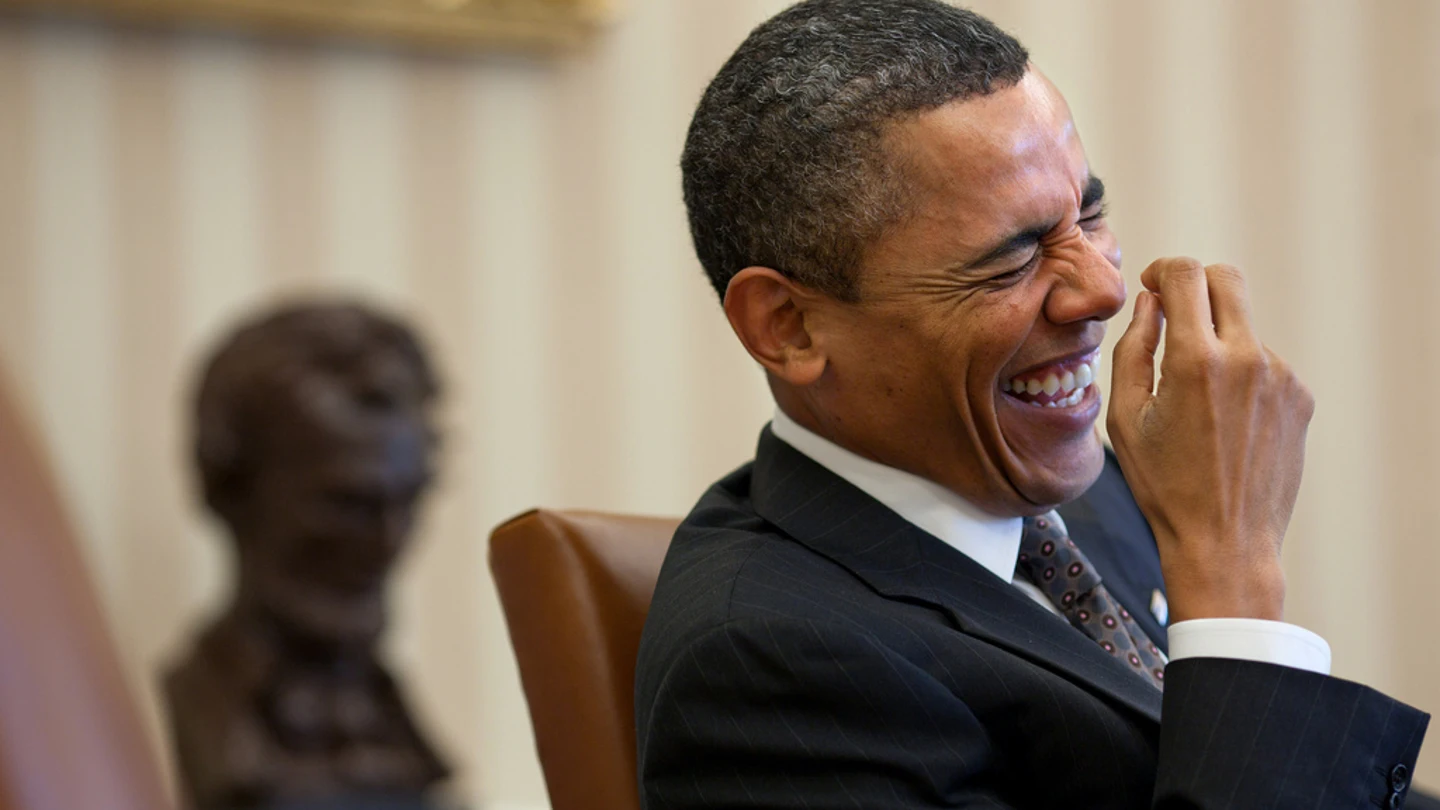 Barack Obama riéndose Barack Obama riéndose