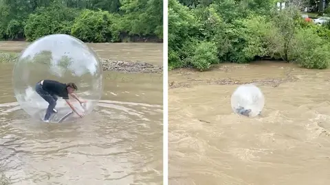 Intenta cruzar el rio en una bola de hamster Intenta cruzar el rio en una bola de hamster