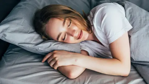 Imagen de una mujer durmiendo Imagen de una mujer durmiendo